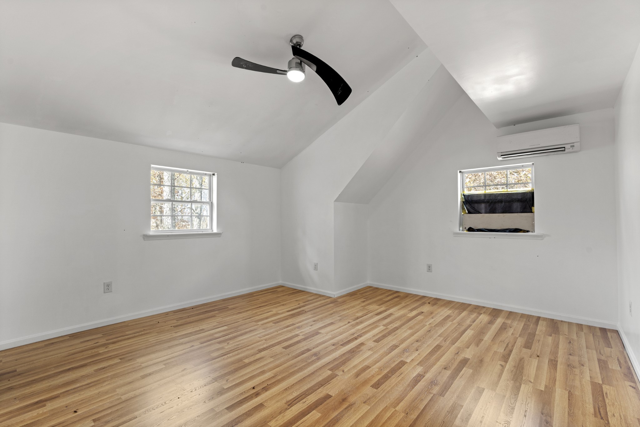 1148 Stoltz Road Centerville, TN 37033 - Photo 23 of 52 a view of a room with wooden floor and window