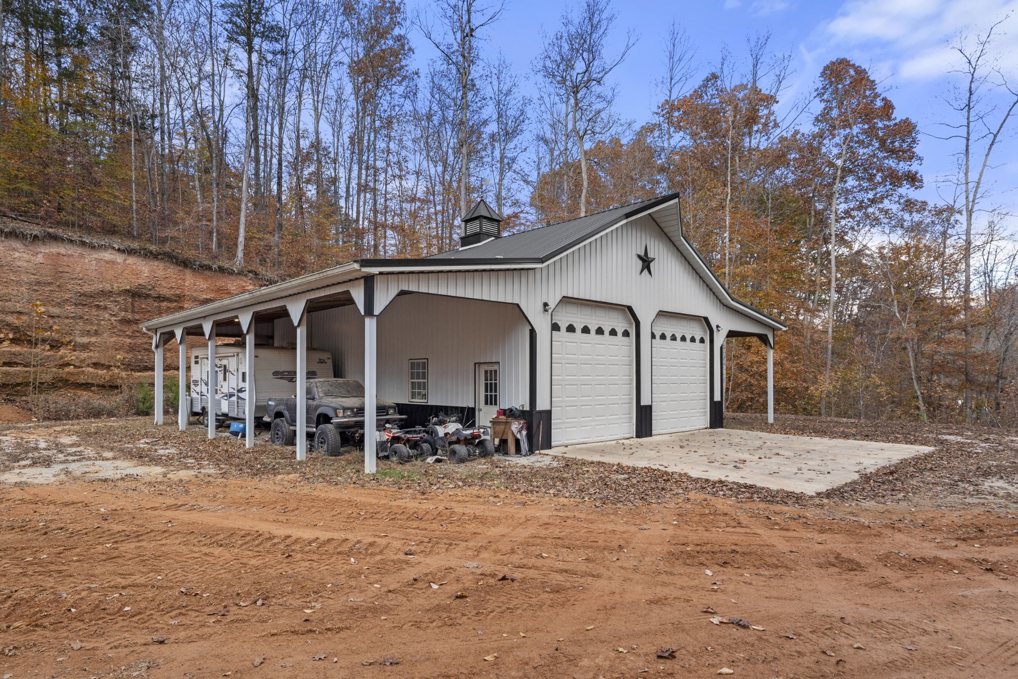1148 Stoltz Road Centerville, TN 37033 - Photo 32 of 52 a large house with a large tree in front of it