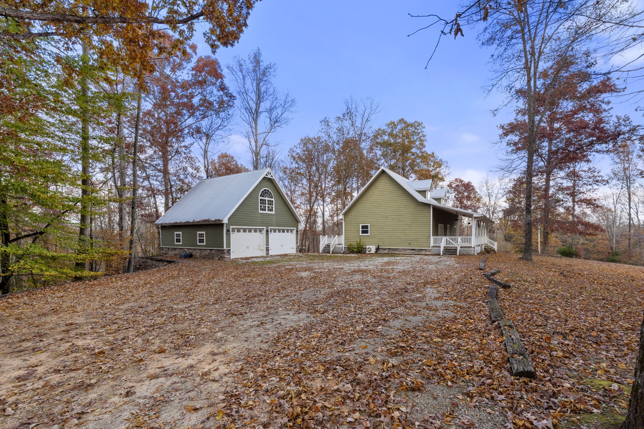 1148 Stoltz Road Centerville, TN 37033 - Photo 34 of 52 a house with a tree in front of it