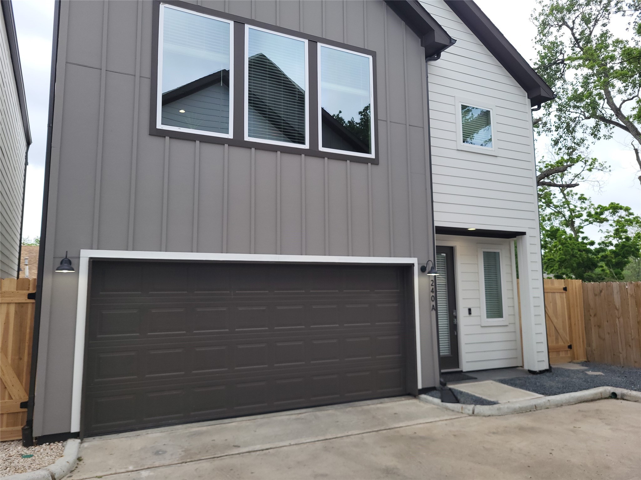 240 Julia Street, Unit A Houston, TX 77022 - Photo 1 of 36 Welcome! View from the private driveway facing the home.