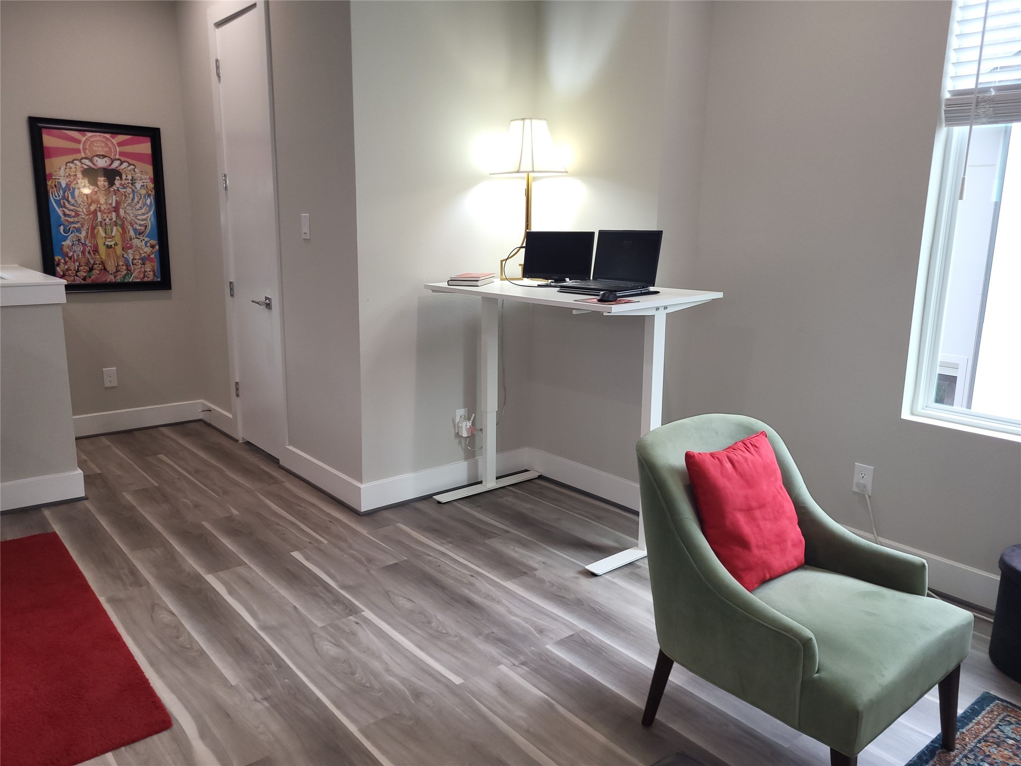 240 Julia Street, Unit A Houston, TX 77022 - Photo 11 of 36 This view includes a close up of a work area with a standing desk.