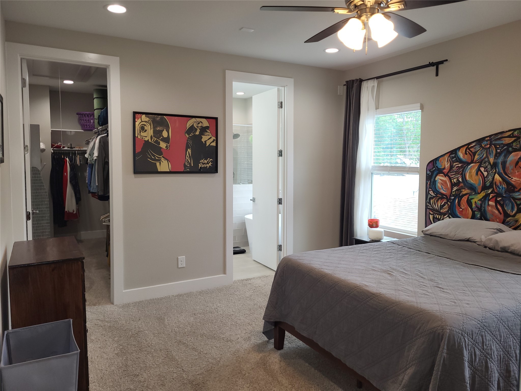 240 Julia Street, Unit A Houston, TX 77022 - Photo 20 of 36 The walk in closet is on the left and the in-suite bath is on the right.
