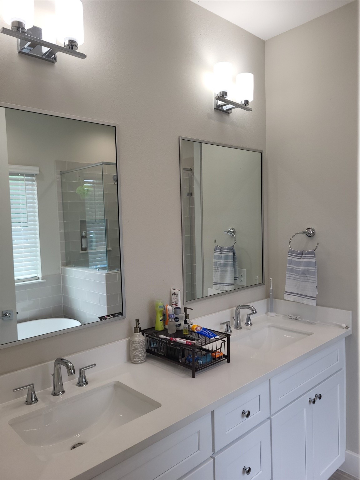 240 Julia Street, Unit A Houston, TX 77022 - Photo 22 of 36 The owner's bath includes dual vanities to the left as you enter from the bedroom.