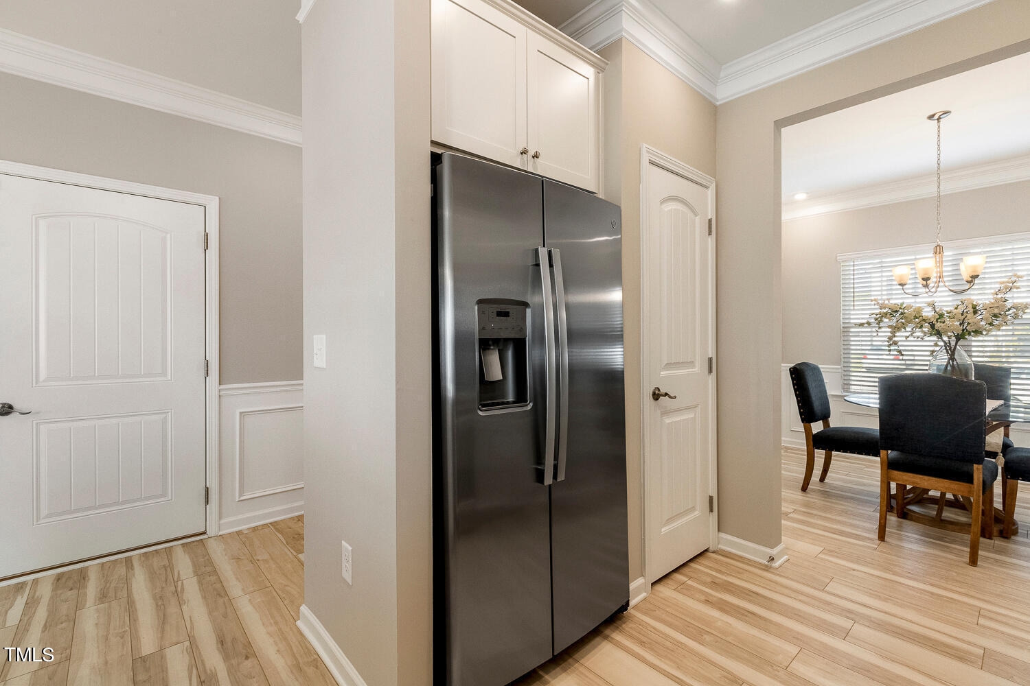 5116 Farm Barn Lane Raleigh, NC 27603 - Photo 11 of 45 a dining room with furniture and wooden floor