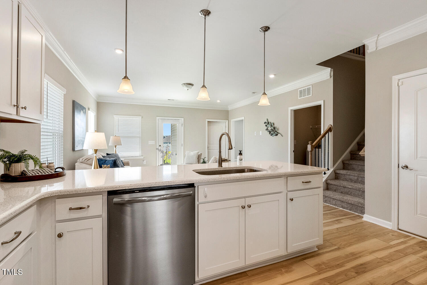 5116 Farm Barn Lane Raleigh, NC 27603 - Photo 13 of 45 a kitchen with a sink window and cabinets