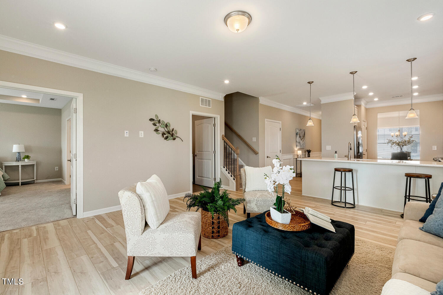 5116 Farm Barn Lane Raleigh, NC 27603 - Photo 15 of 45 a living room with furniture kitchen view and a large window