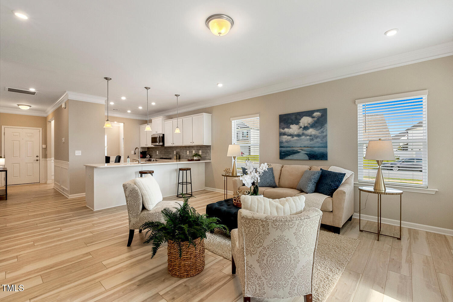 5116 Farm Barn Lane Raleigh, NC 27603 - Photo 16 of 45 a living room with furniture and a table