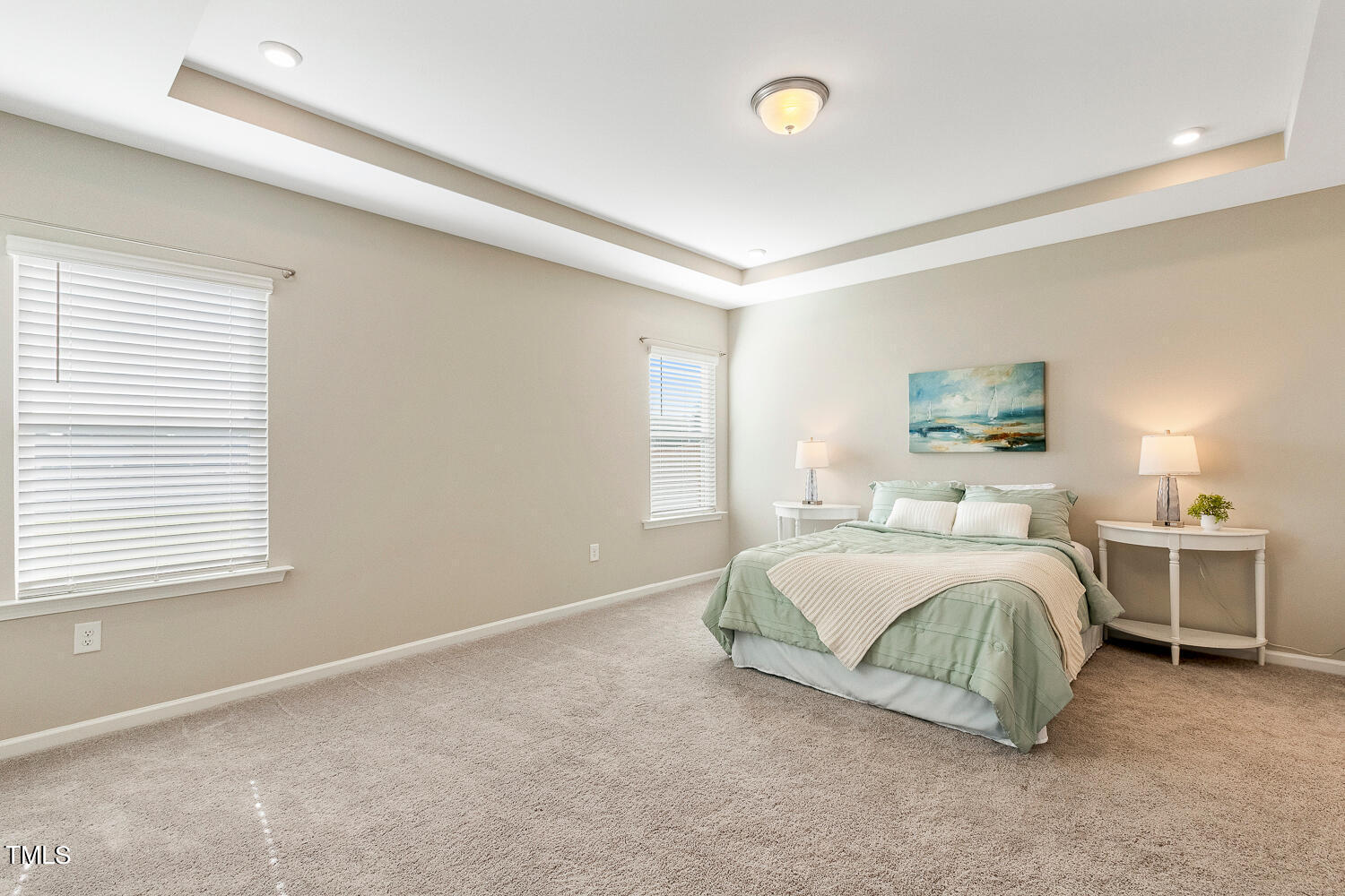 5116 Farm Barn Lane Raleigh, NC 27603 - Photo 20 of 45 a spacious bedroom with a bed and a window