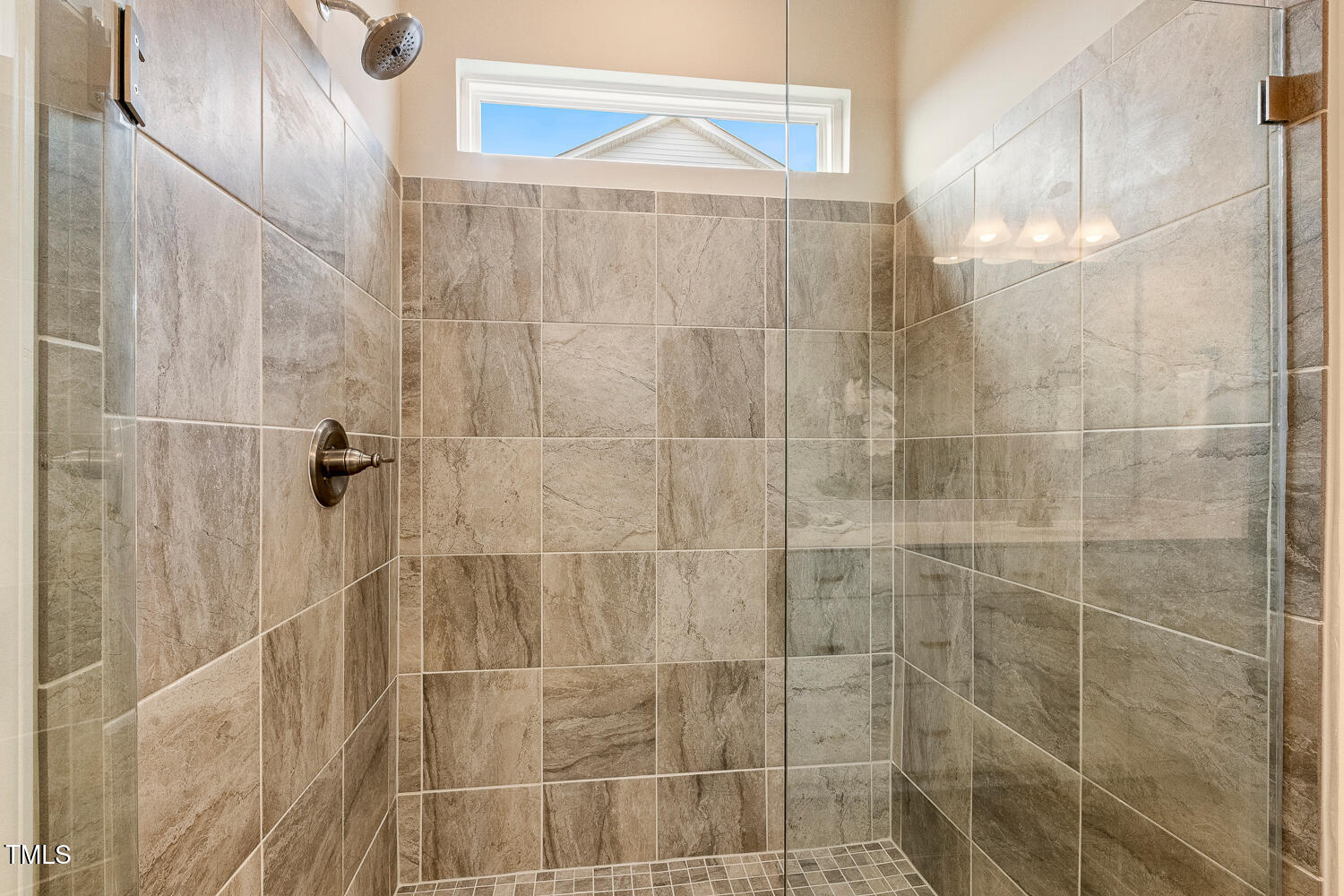 5116 Farm Barn Lane Raleigh, NC 27603 - Photo 25 of 45 a bathroom with a shower