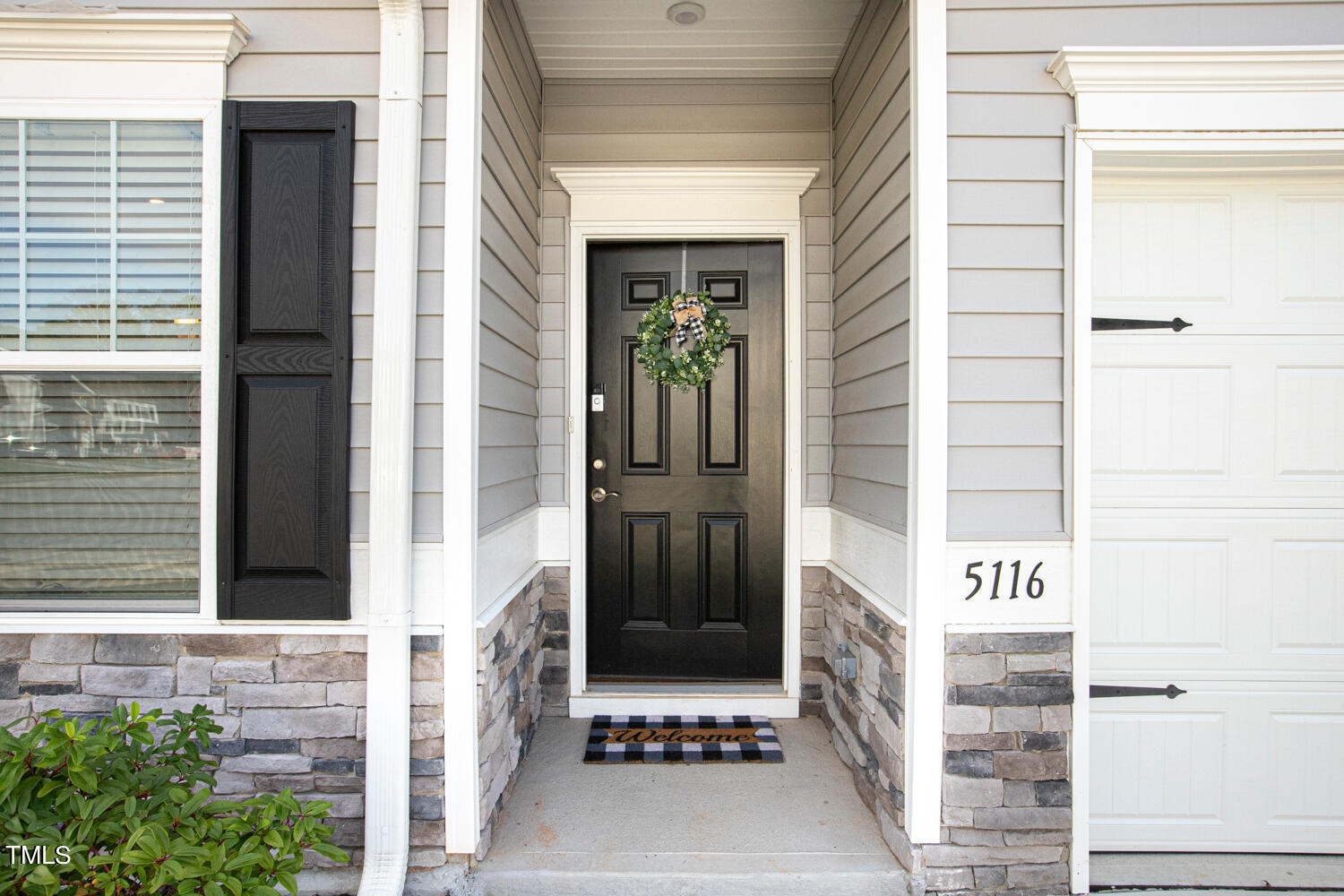 5116 Farm Barn Lane Raleigh, NC 27603 - Photo 3 of 45 a view of front door of house with stairs