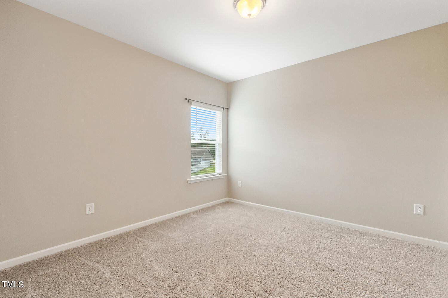 5116 Farm Barn Lane Raleigh, NC 27603 - Photo 34 of 45 an empty room with a window