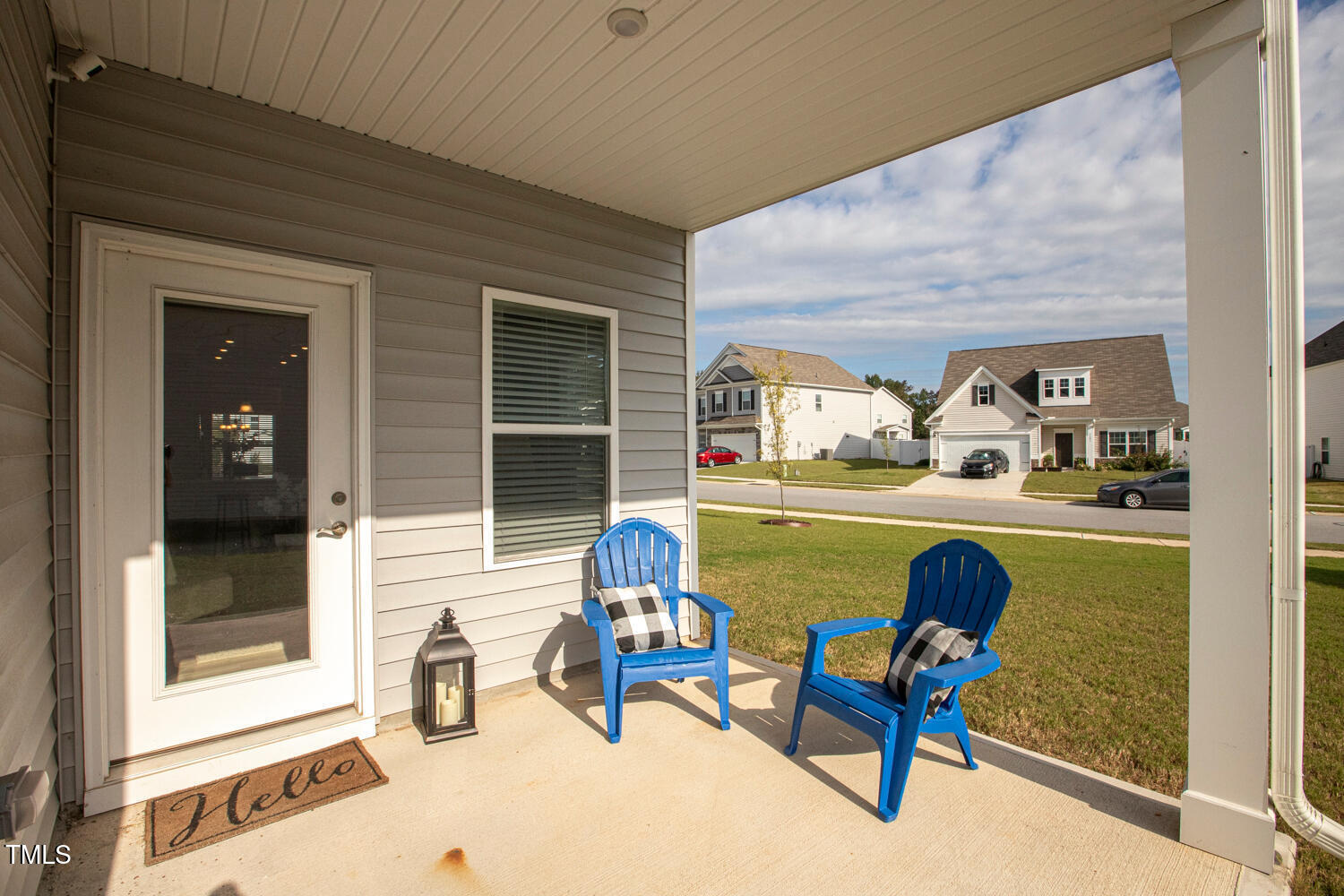 5116 Farm Barn Lane Raleigh, NC 27603 - Photo 35 of 45 a front view of a house with outdoor seating