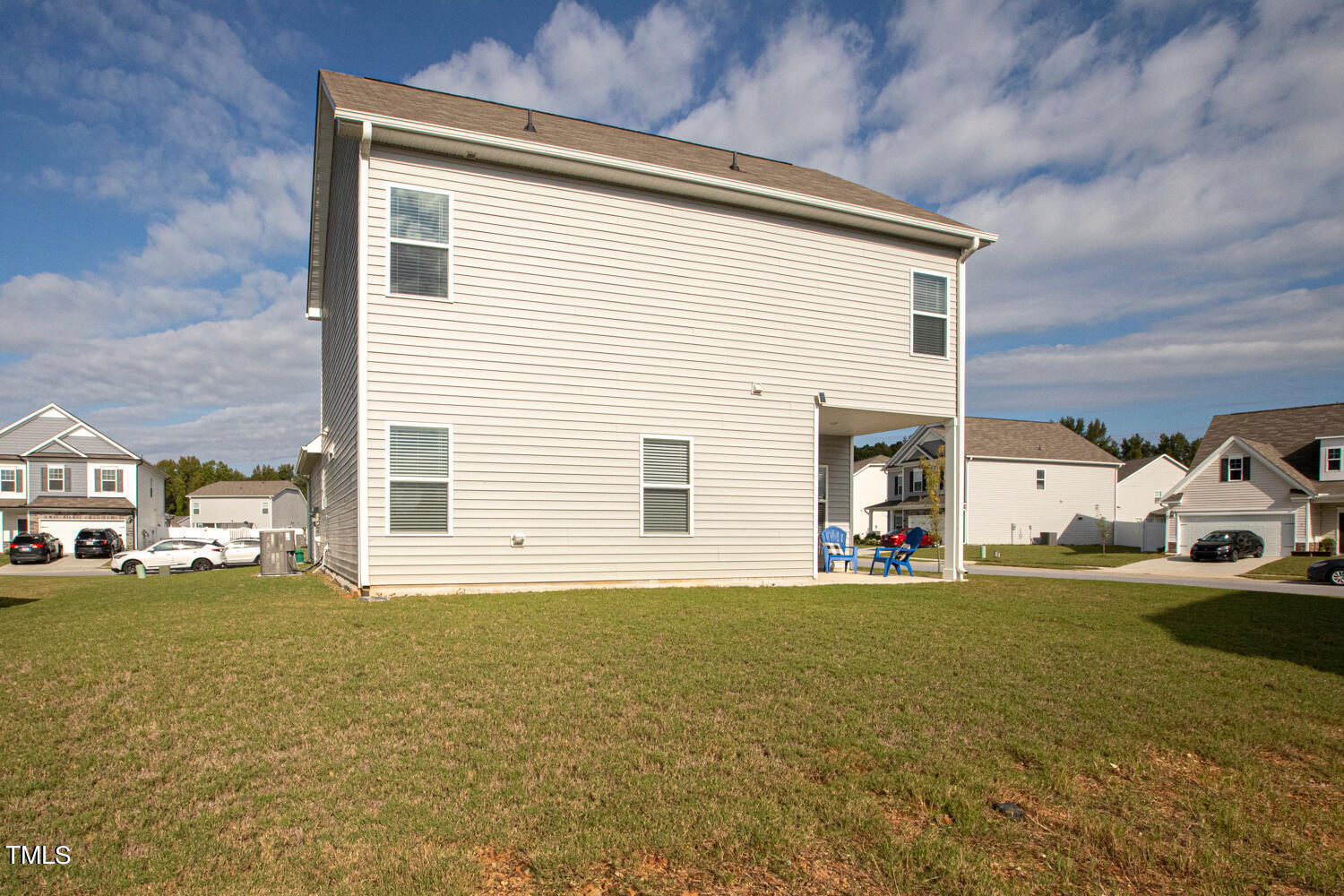 5116 Farm Barn Lane Raleigh, NC 27603 - Photo 39 of 45 a view of a house with a yard