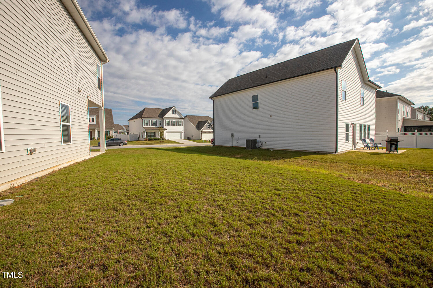 5116 Farm Barn Lane Raleigh, NC 27603 - Photo 43 of 45 a view of a house with a yard