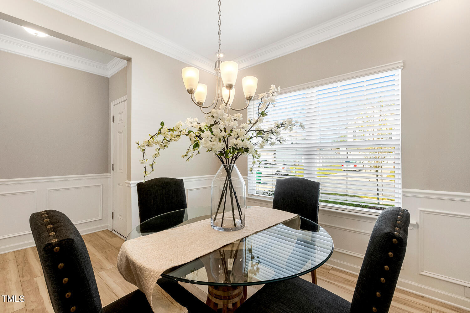 5116 Farm Barn Lane Raleigh, NC 27603 - Photo 6 of 45 a view of a dining room with furniture and wooden floor
