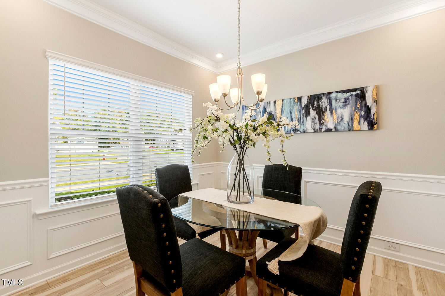 5116 Farm Barn Lane Raleigh, NC 27603 - Photo 7 of 45 a view of a dining room with furniture window and wooden floor