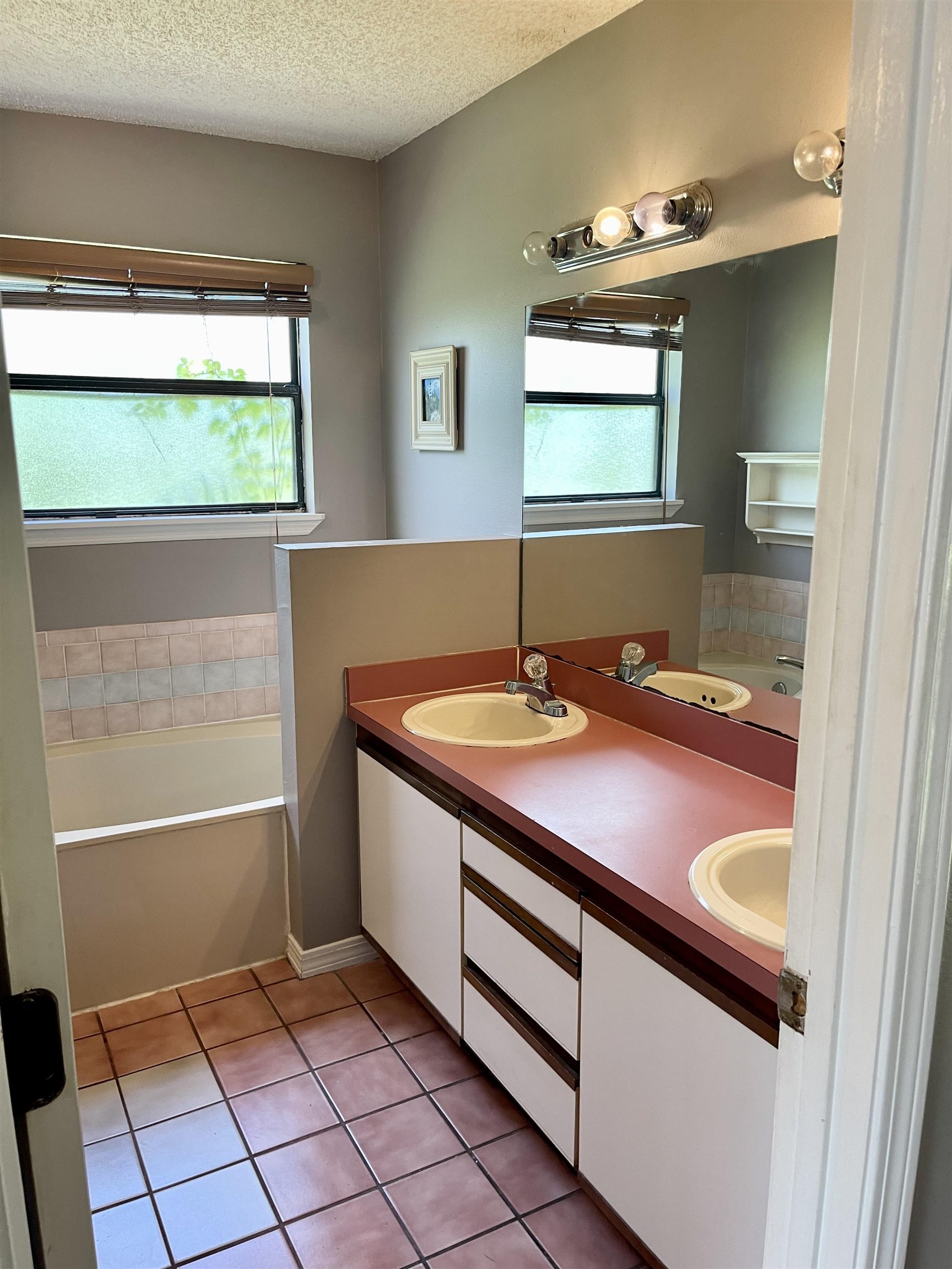 209 Gerona Road St. Augustine, FL 32086 - Photo 11 of 23 a bathroom with a sink and a mirror