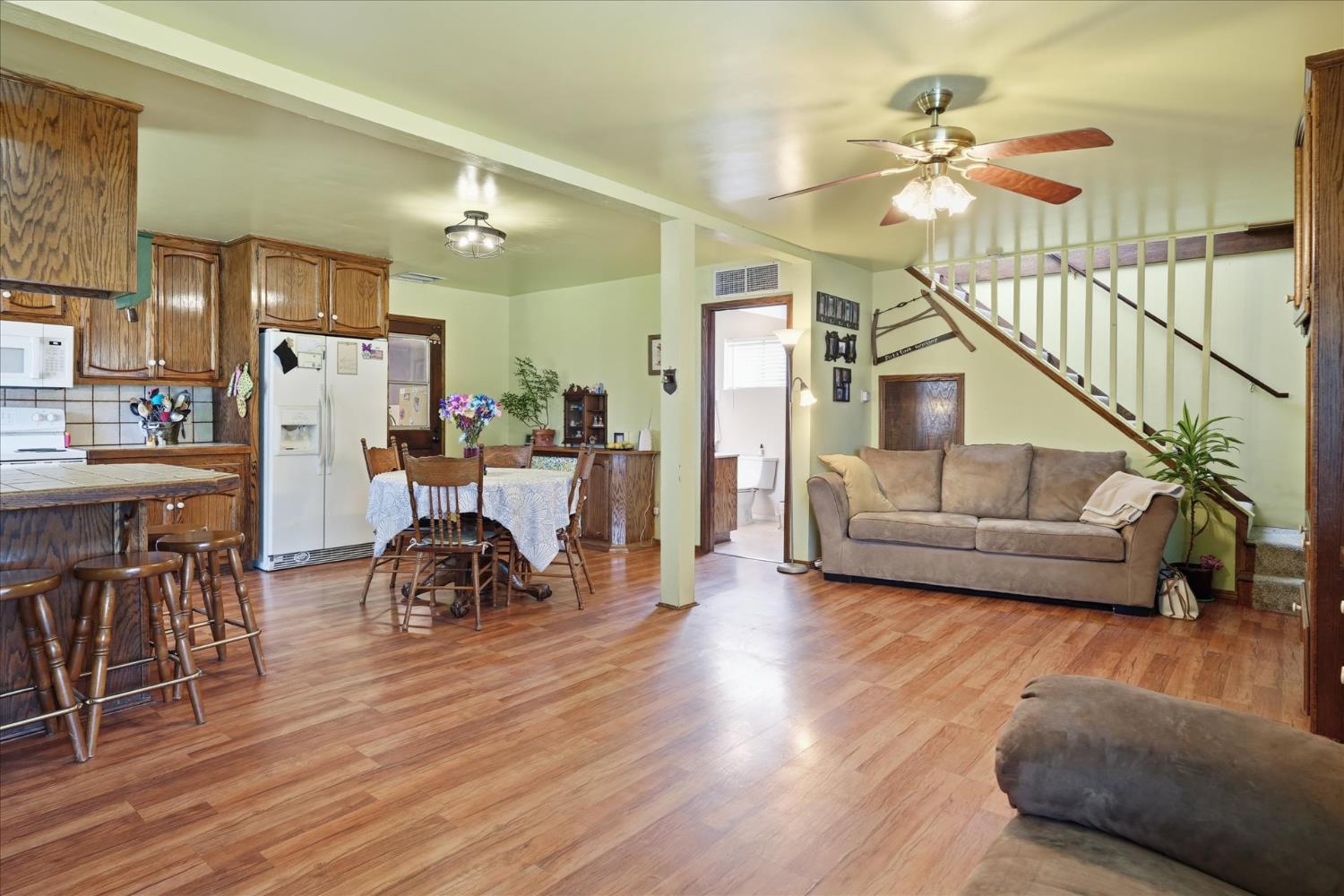 31325 Delaware Road Coarsegold, CA 93614 - Photo 18 of 39 a living room with furniture and a wooden floor
