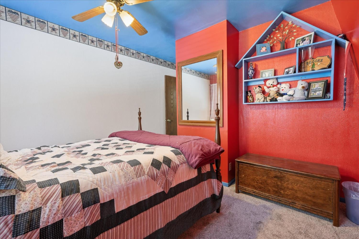 31325 Delaware Road Coarsegold, CA 93614 - Photo 35 of 39 a bedroom with a bed and a painting on the wall