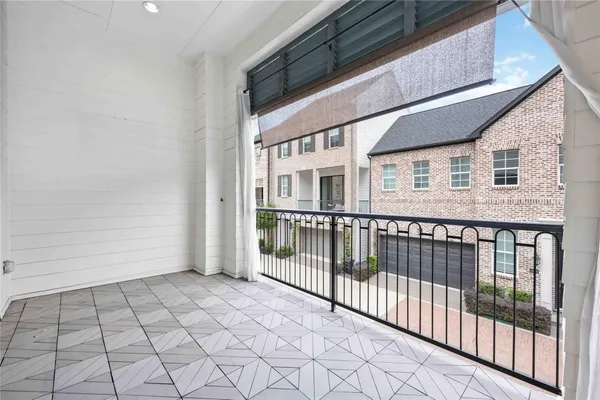 a view of a brick house with wooden floor