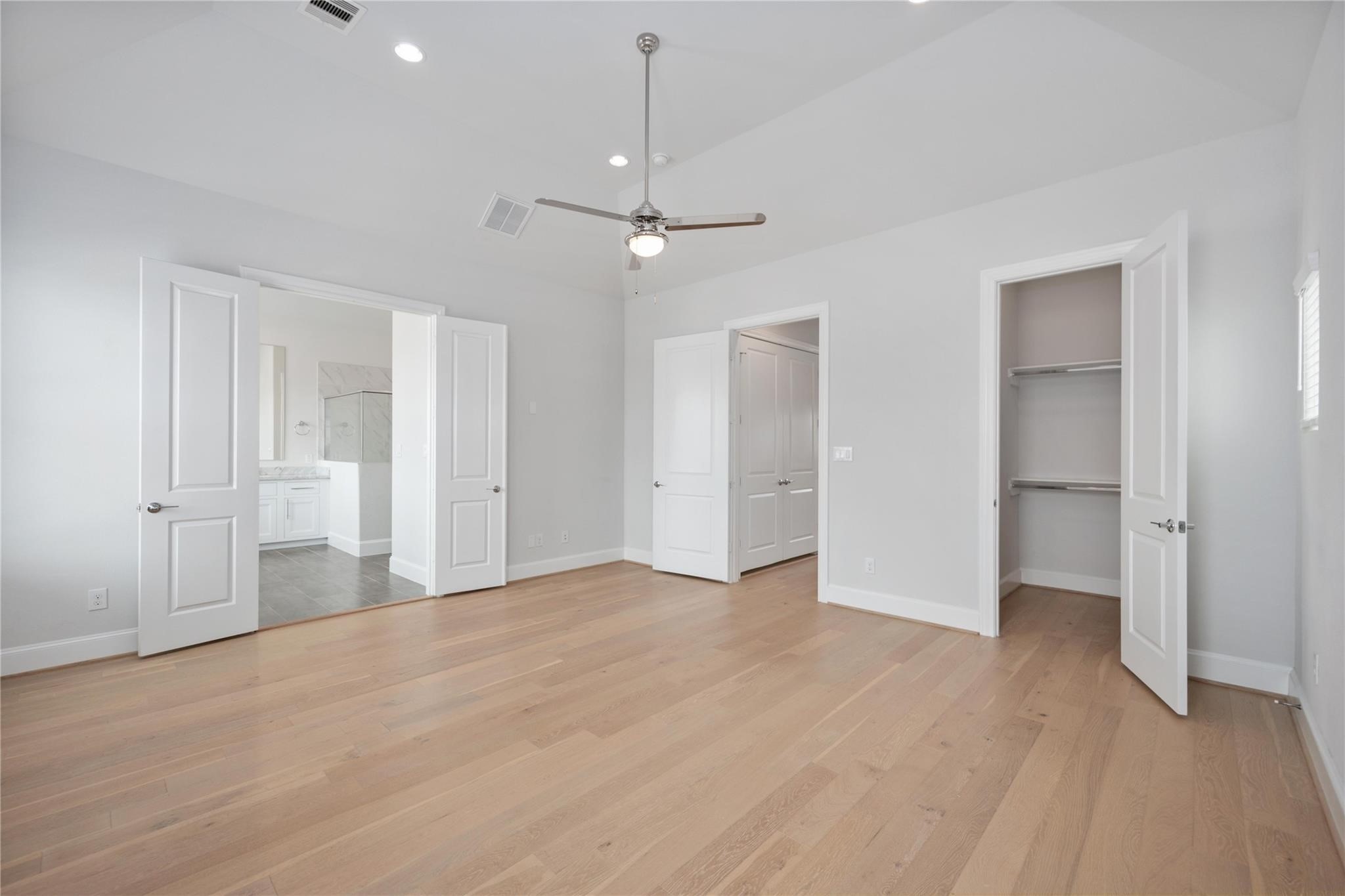 10919 Grove Tree Lane Houston, TX 77043 - Photo 26 of 43 a view of an empty room with a window