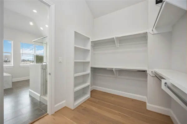 a view of an empty walk in closet