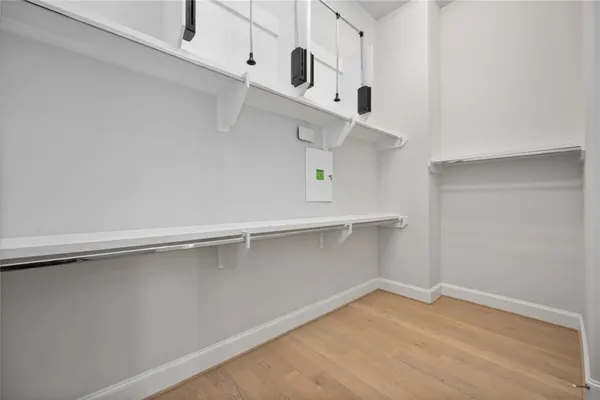 a view of an empty walk in closet