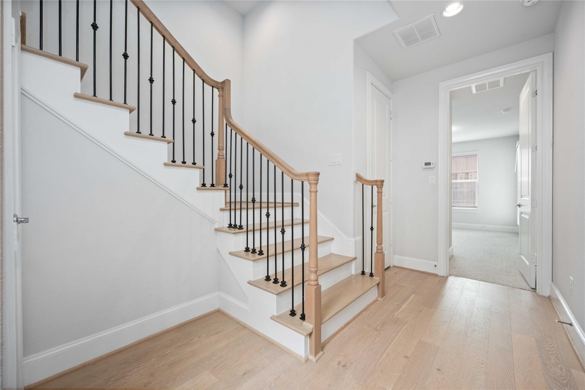 10919 Grove Tree Lane Houston, TX 77043 - Photo 6 of 43 a view of entryway with stairs