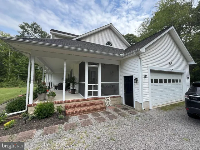 a view of a house with a porch
