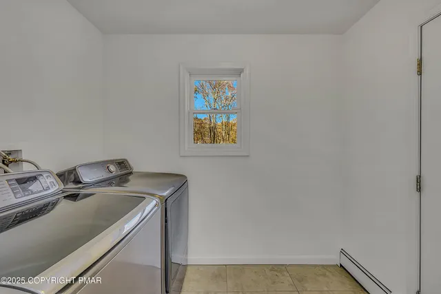 a utility room with storage and utility