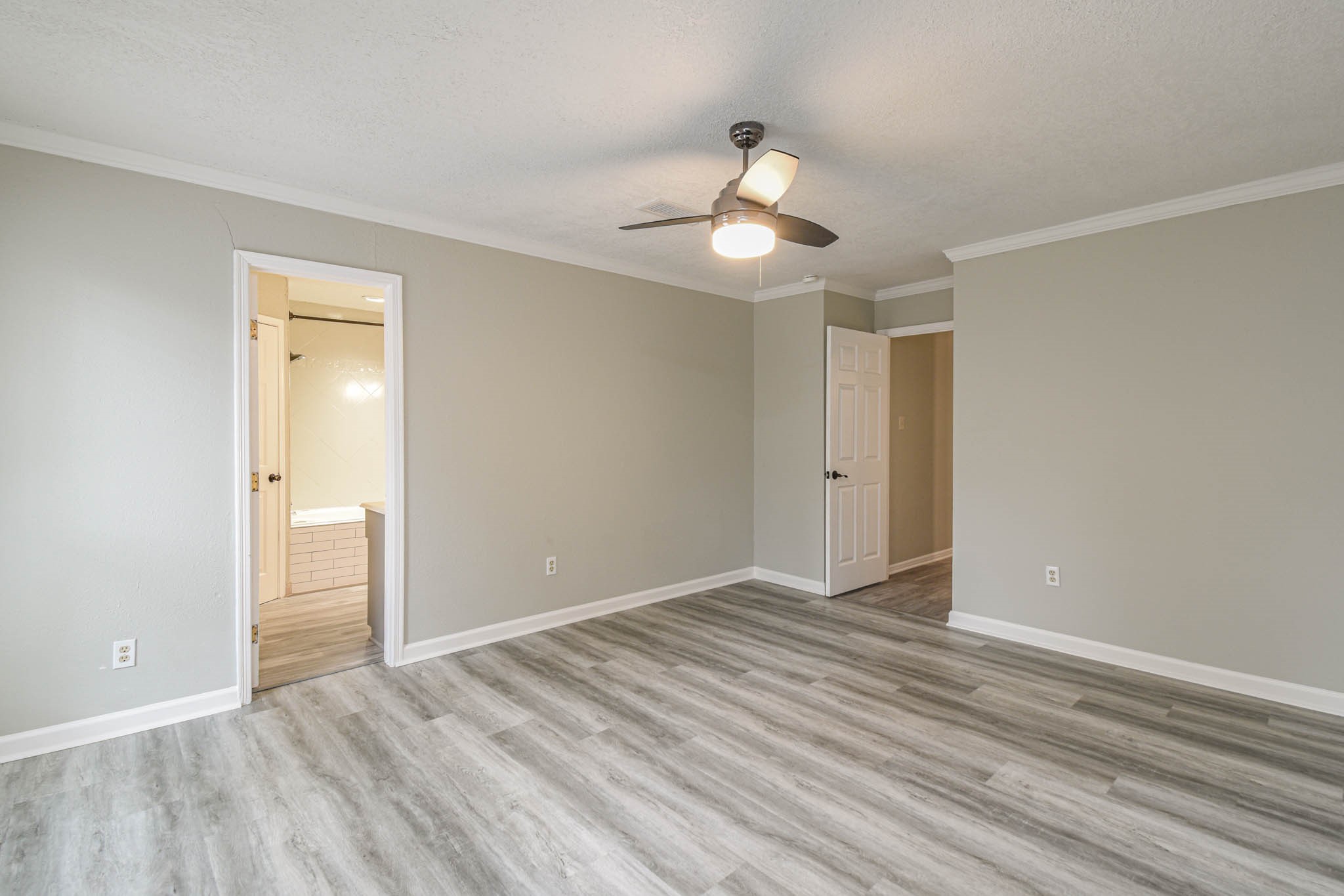 16911 Summit Oaks Lane Spring, TX 77379 - Photo 19 of 24 a view of an empty room with wooden floor