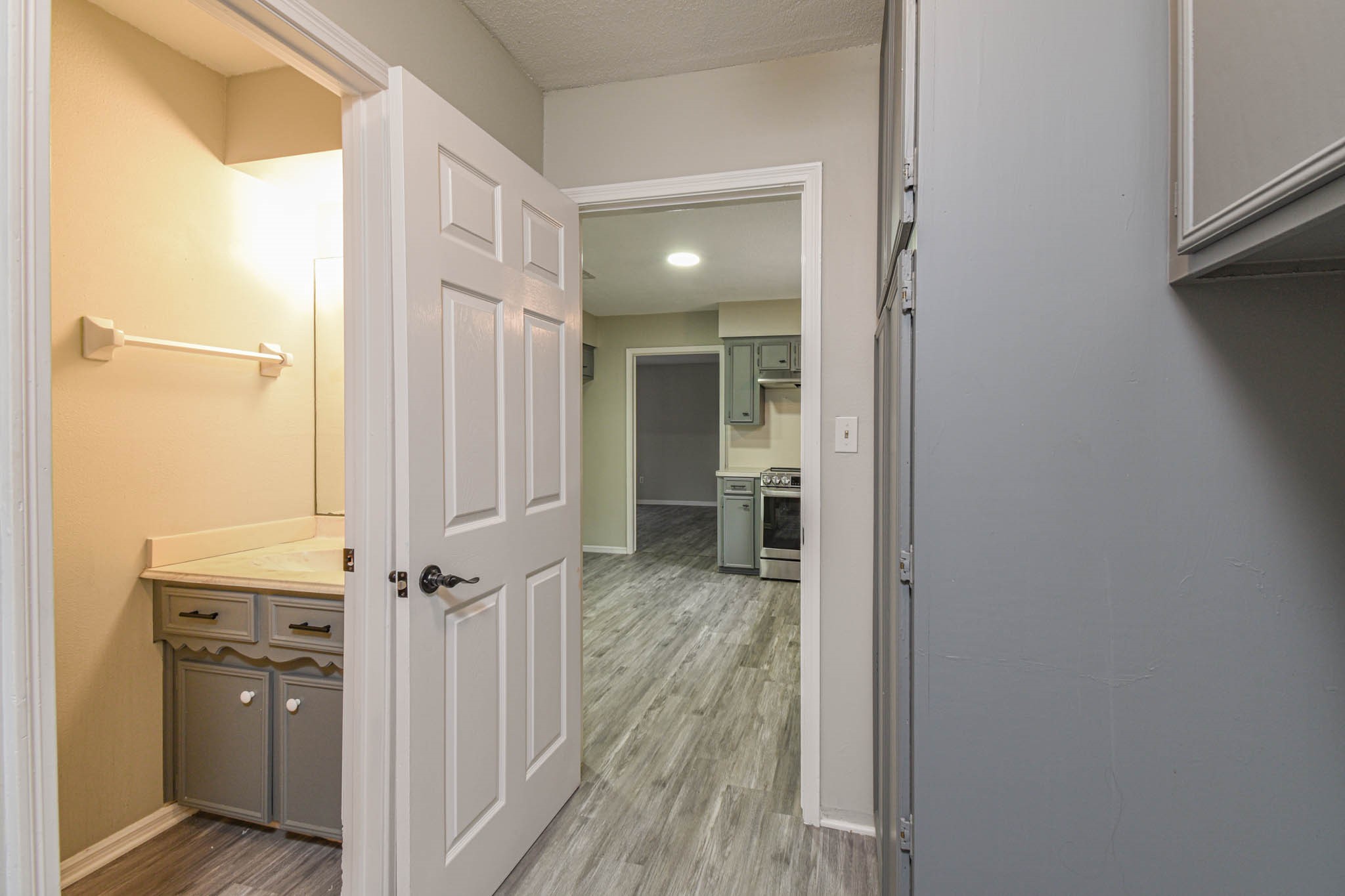 16911 Summit Oaks Lane Spring, TX 77379 - Photo 21 of 24 a view of a hallway with wooden floor and entryway