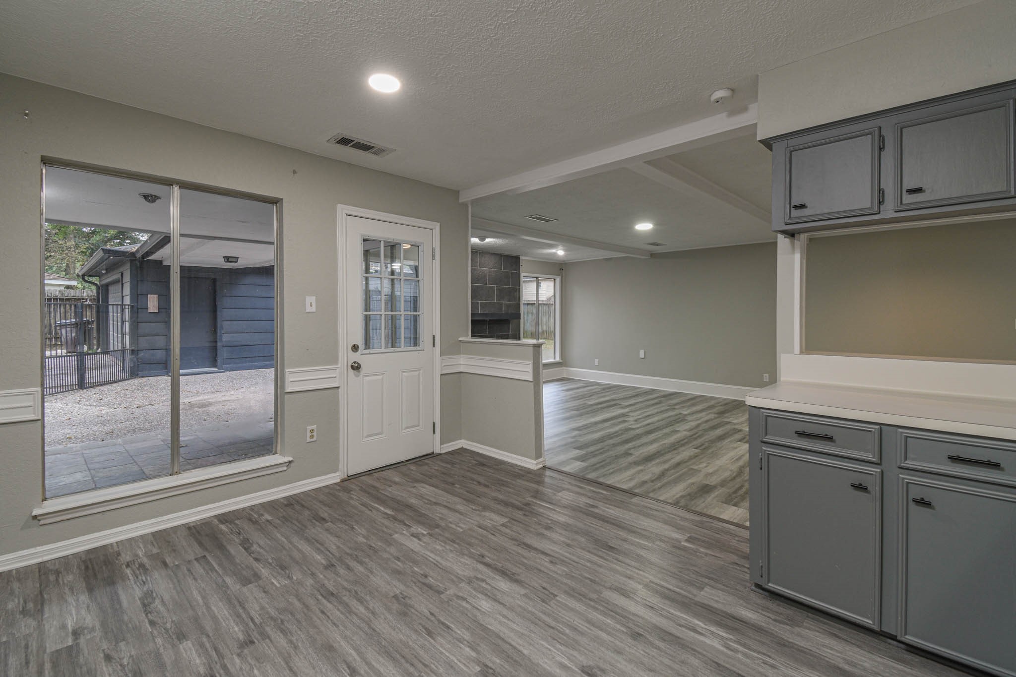 16911 Summit Oaks Lane Spring, TX 77379 - Photo 9 of 24 a view of a kitchen cabinets and wooden floor