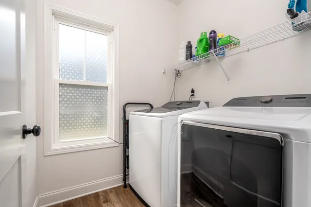 a utility room with dryer and washer