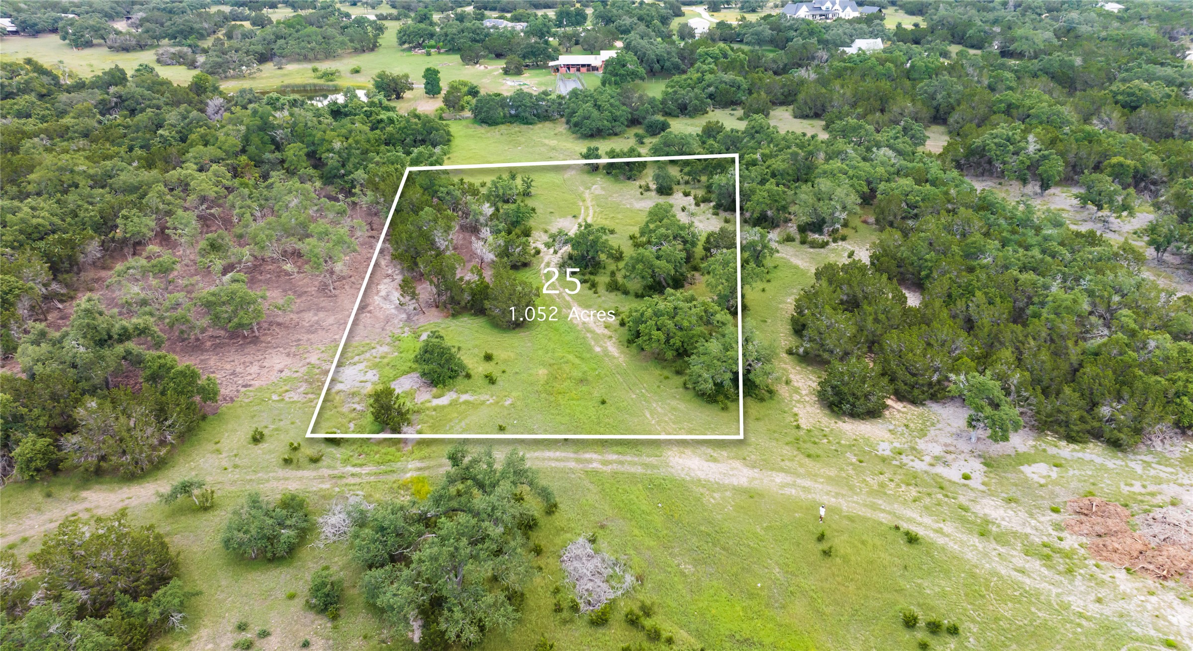 Tbd Evergreen Way Austin, TX 78737 - Photo 2 of 7 Aerial view of sparsely populated area featuring property boundaries highlighted