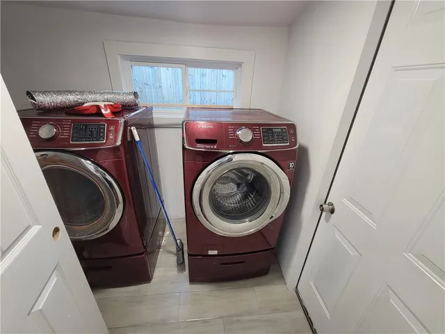a utility room with dryer and washer