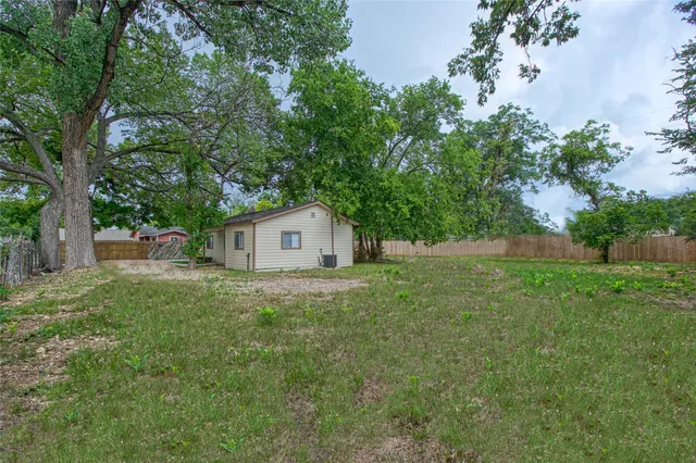a fire hydrant in the middle of a field