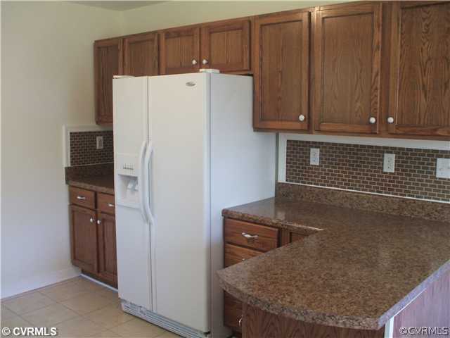 5804 West Rois Road Richmond, VA 23227 - Photo 4 of 8 Kitchen - Another view of kitchen cabinets and ref