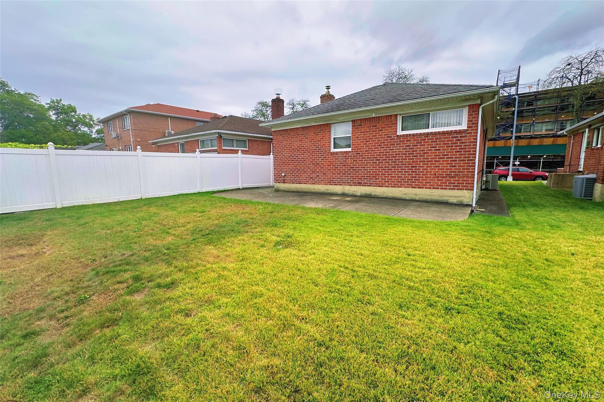 166-27 16th Avenue Queens, NY 11357 - Photo 1 of 10 a house with pool in front of it