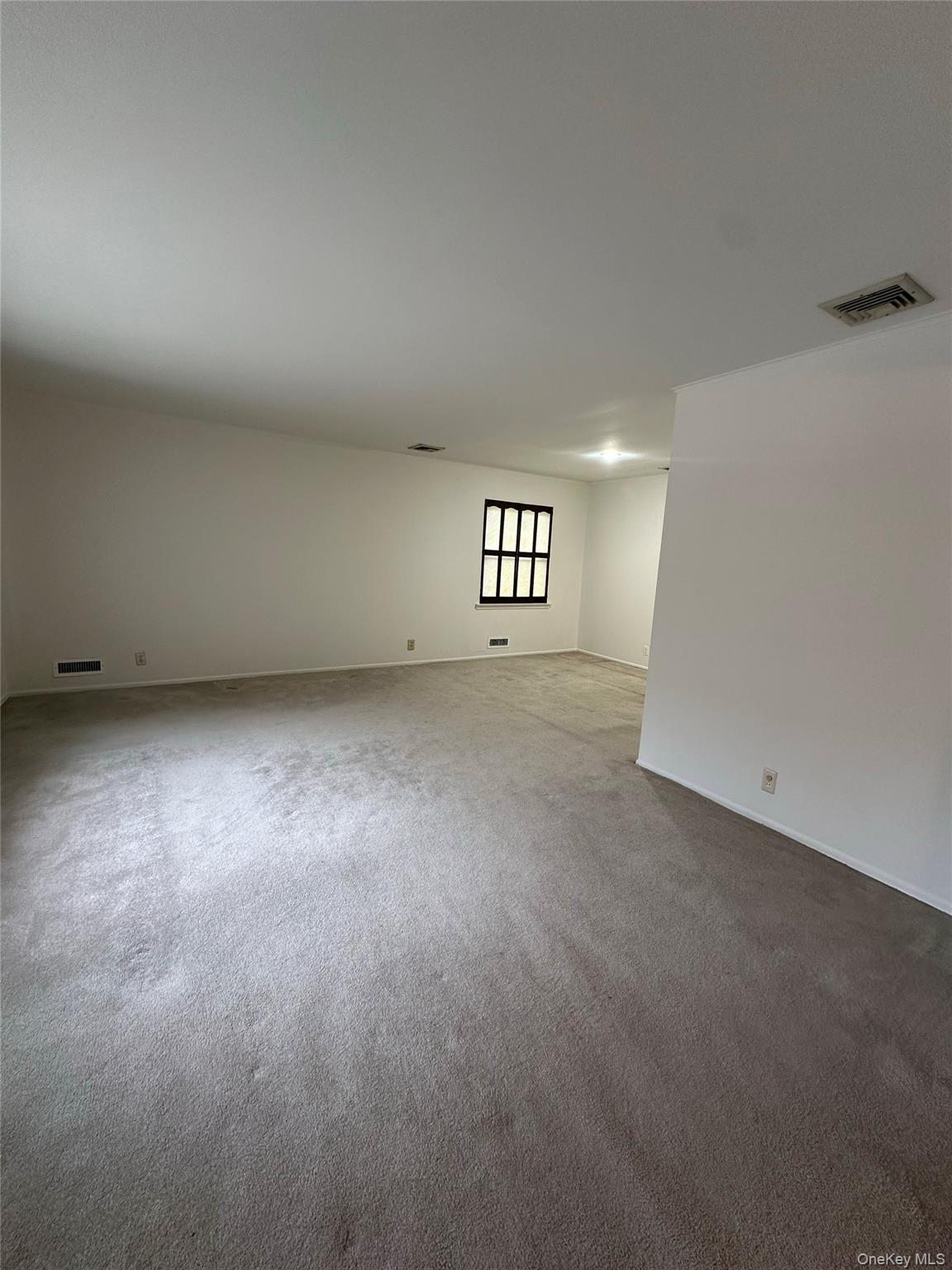 166-27 16th Avenue Queens, NY 11357 - Photo 5 of 10 a view of an empty room with a window