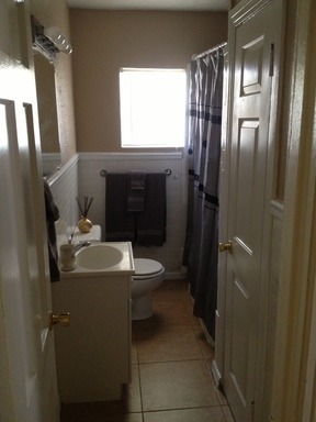 106 Hardy Street Bryan, TX 77801 - Photo 11 of 27 a bathroom with a sink toilet and shower