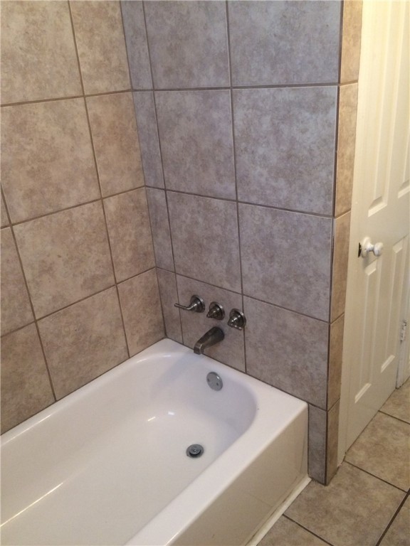 106 Hardy Street Bryan, TX 77801 - Photo 17 of 27 a bathroom with a bathtub