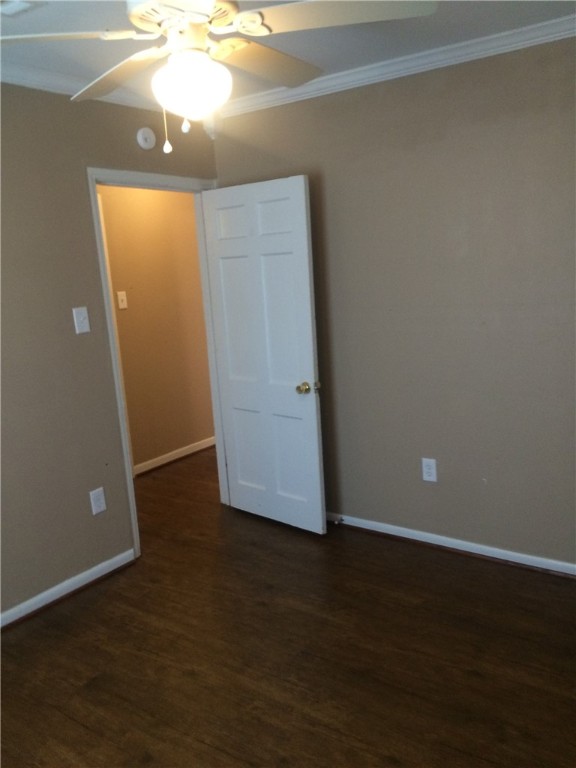 106 Hardy Street Bryan, TX 77801 - Photo 19 of 27 an empty room with wooden floor and windows