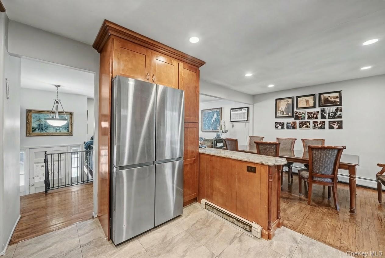 6 Kakiat Lane Spring Valley, NY 10977 - Photo 11 of 25 a kitchen with stainless steel appliances granite countertop a refrigerator and a stove top oven