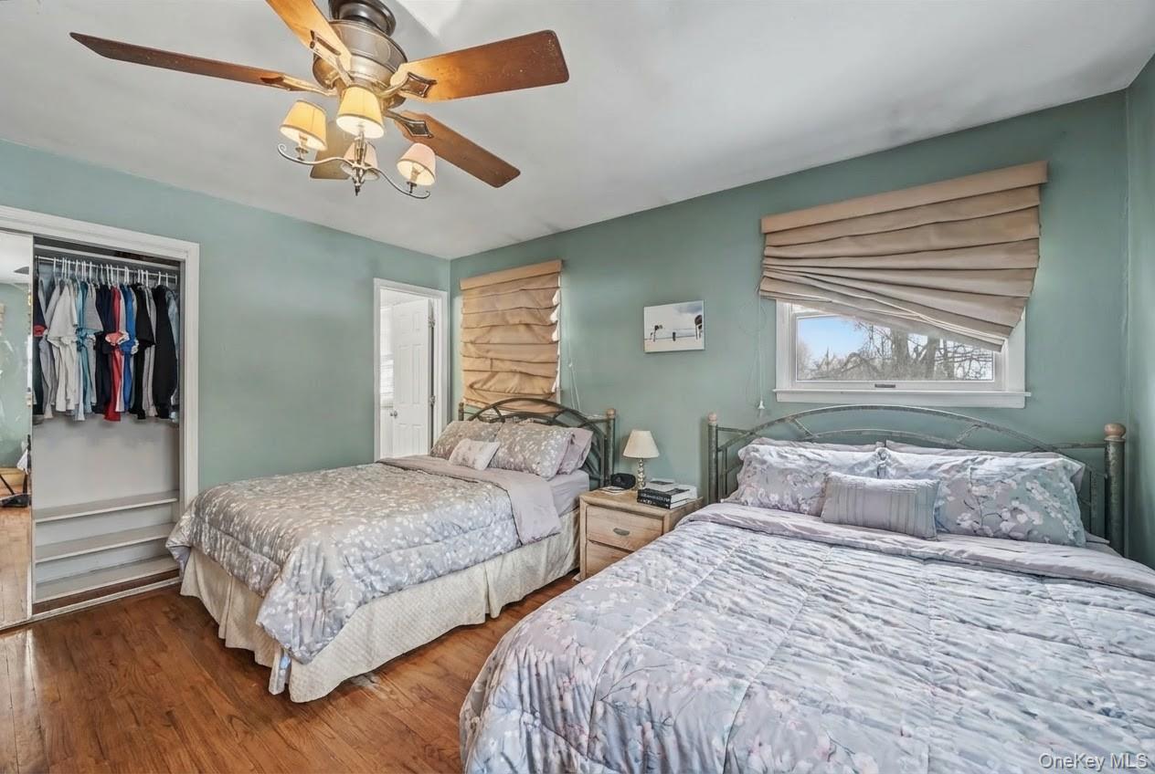 6 Kakiat Lane Spring Valley, NY 10977 - Photo 13 of 25 a bedroom with two beds and a window