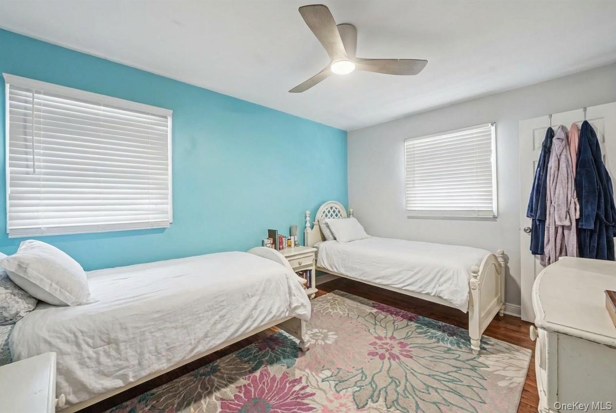 6 Kakiat Lane Spring Valley, NY 10977 - Photo 15 of 25 a bedroom with a bed and a window