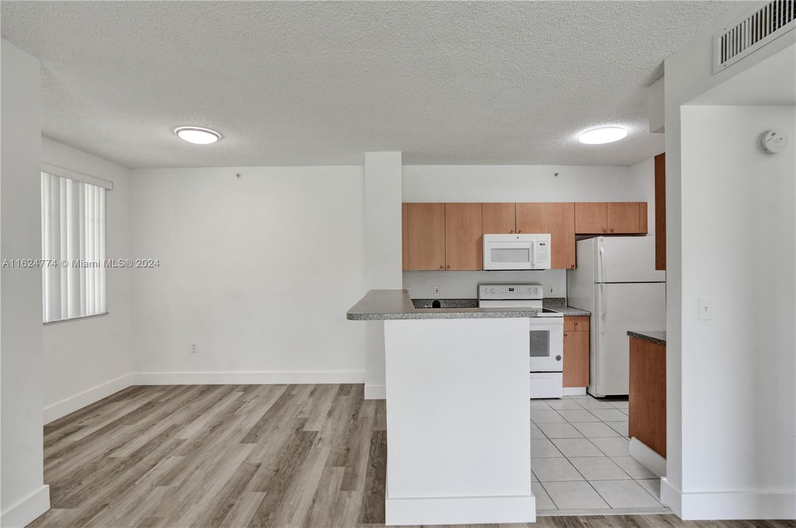 8010 North Nob Hill Road, Unit 108 Tamarac, FL 33321 - Photo 20 of 35