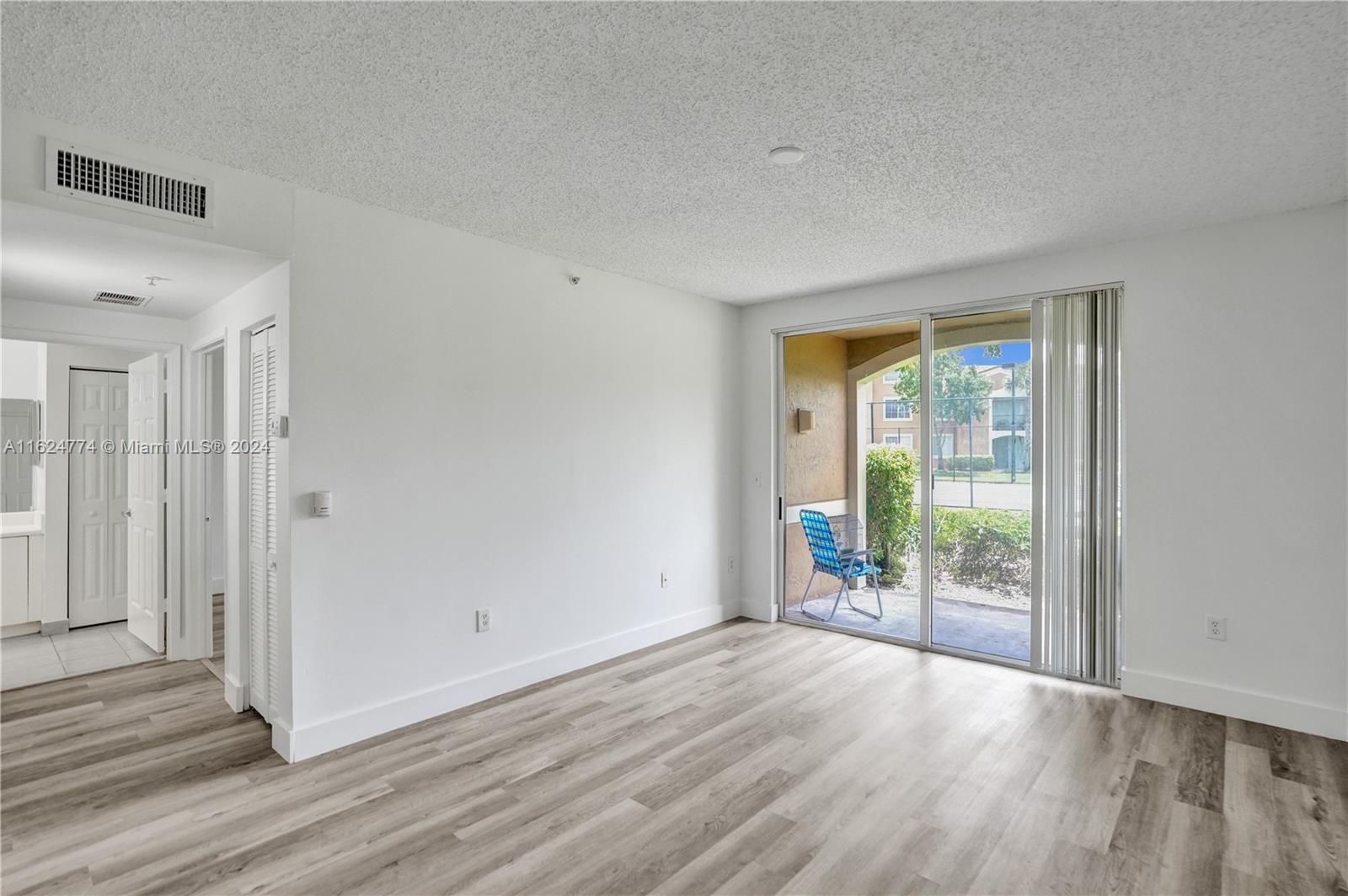 8010 North Nob Hill Road, Unit 108 Tamarac, FL 33321 - Photo 2 of 35 New vinyl plank floors!