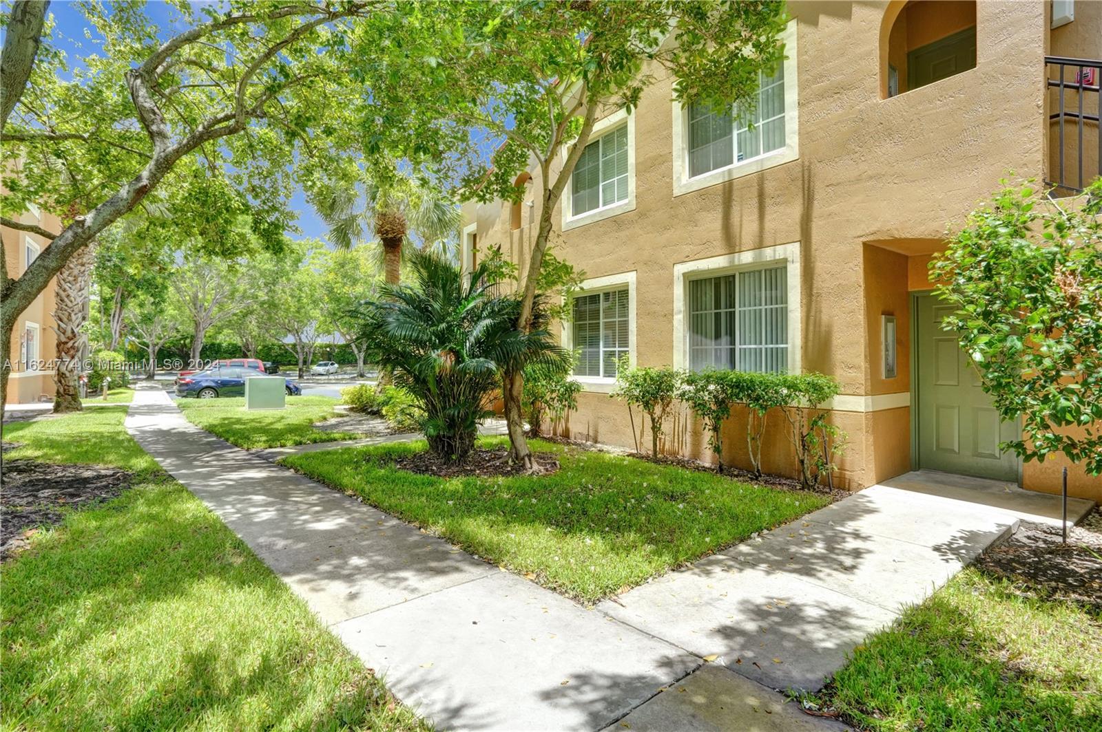 8010 North Nob Hill Road, Unit 108 Tamarac, FL 33321 - Photo 21 of 35 Parking spot at building