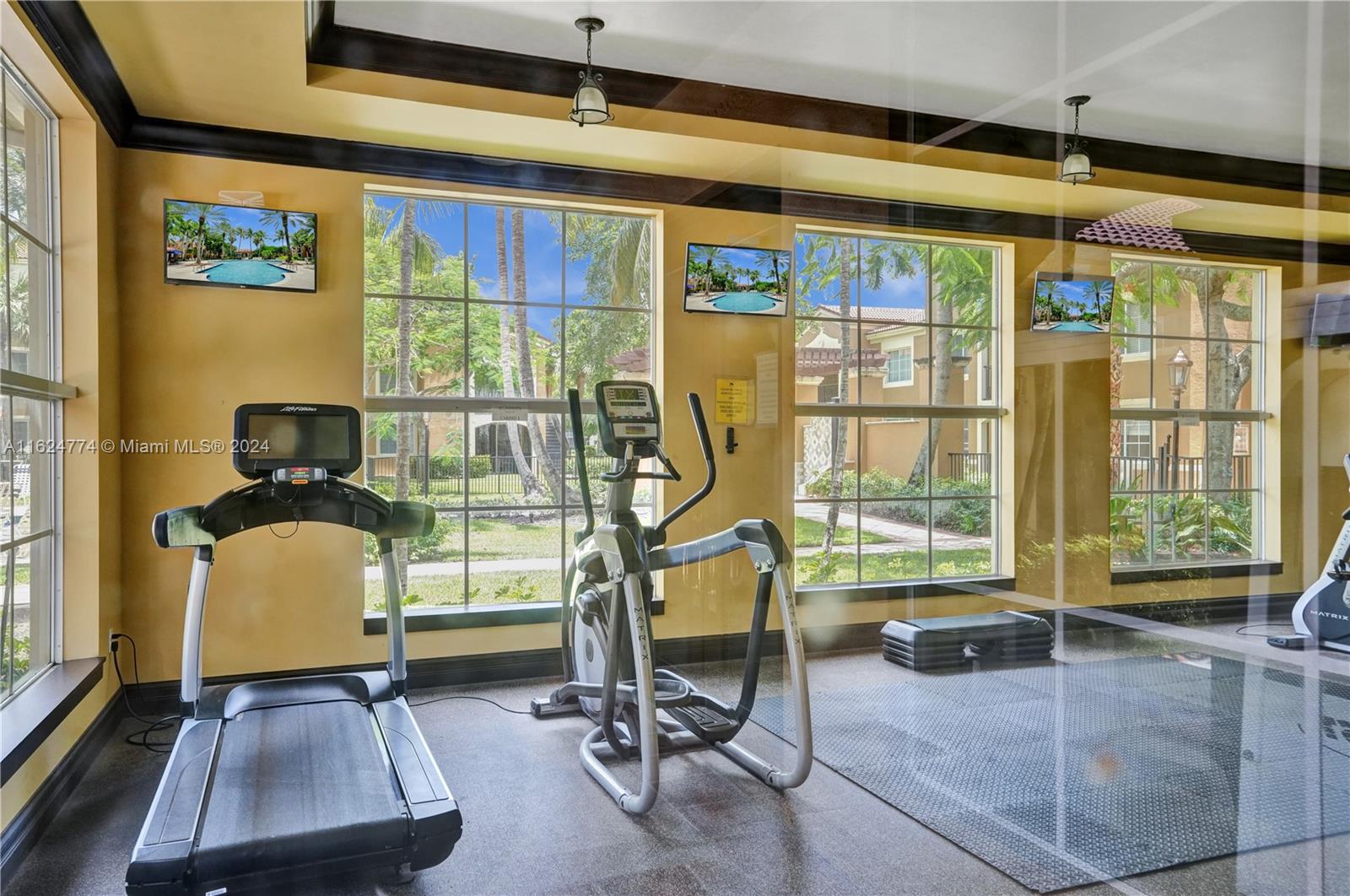 8010 North Nob Hill Road, Unit 108 Tamarac, FL 33321 - Photo 33 of 35 Fully equipped fitness center. Weights, Peloton & more